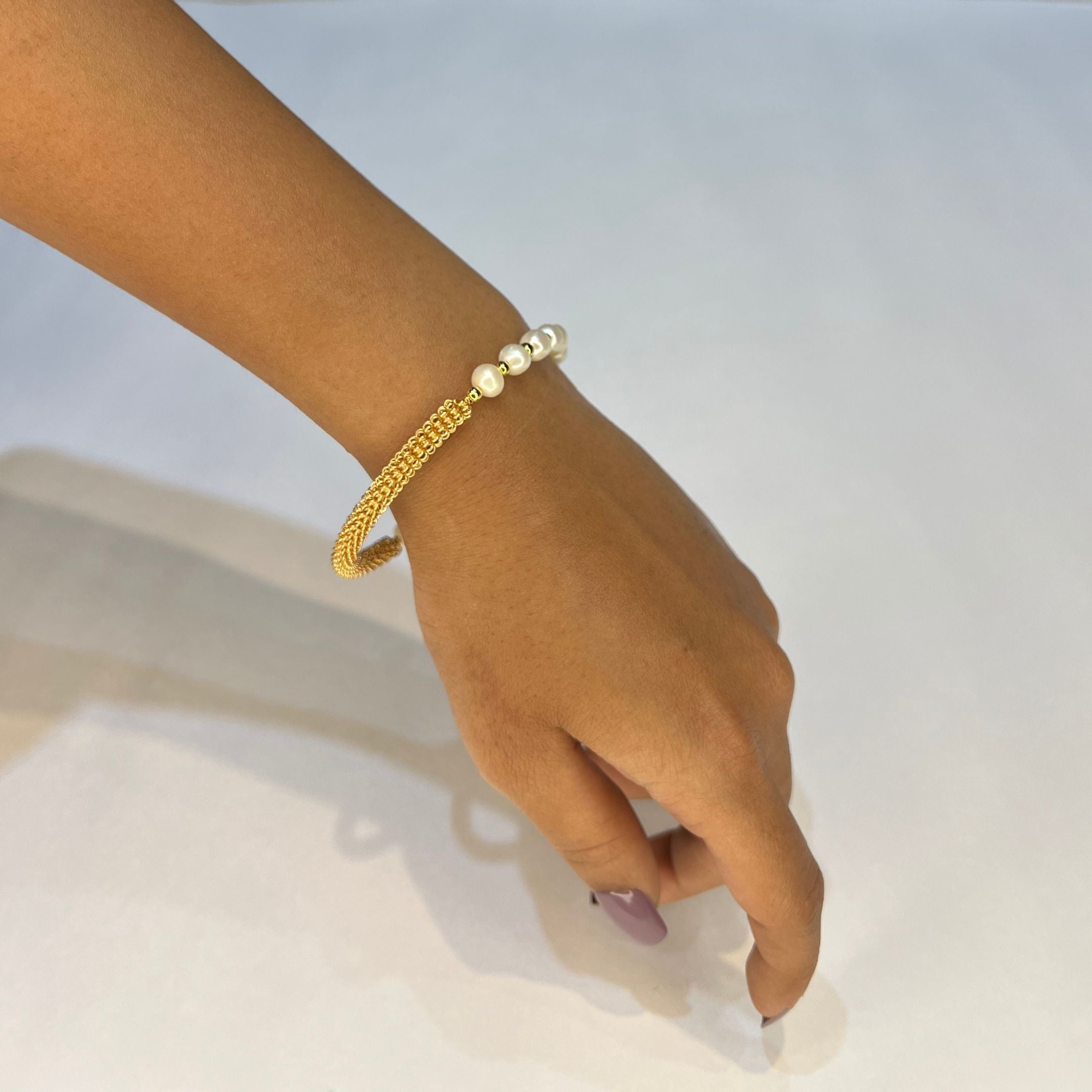 Divine Knot Pearl Rakhi Bracelet