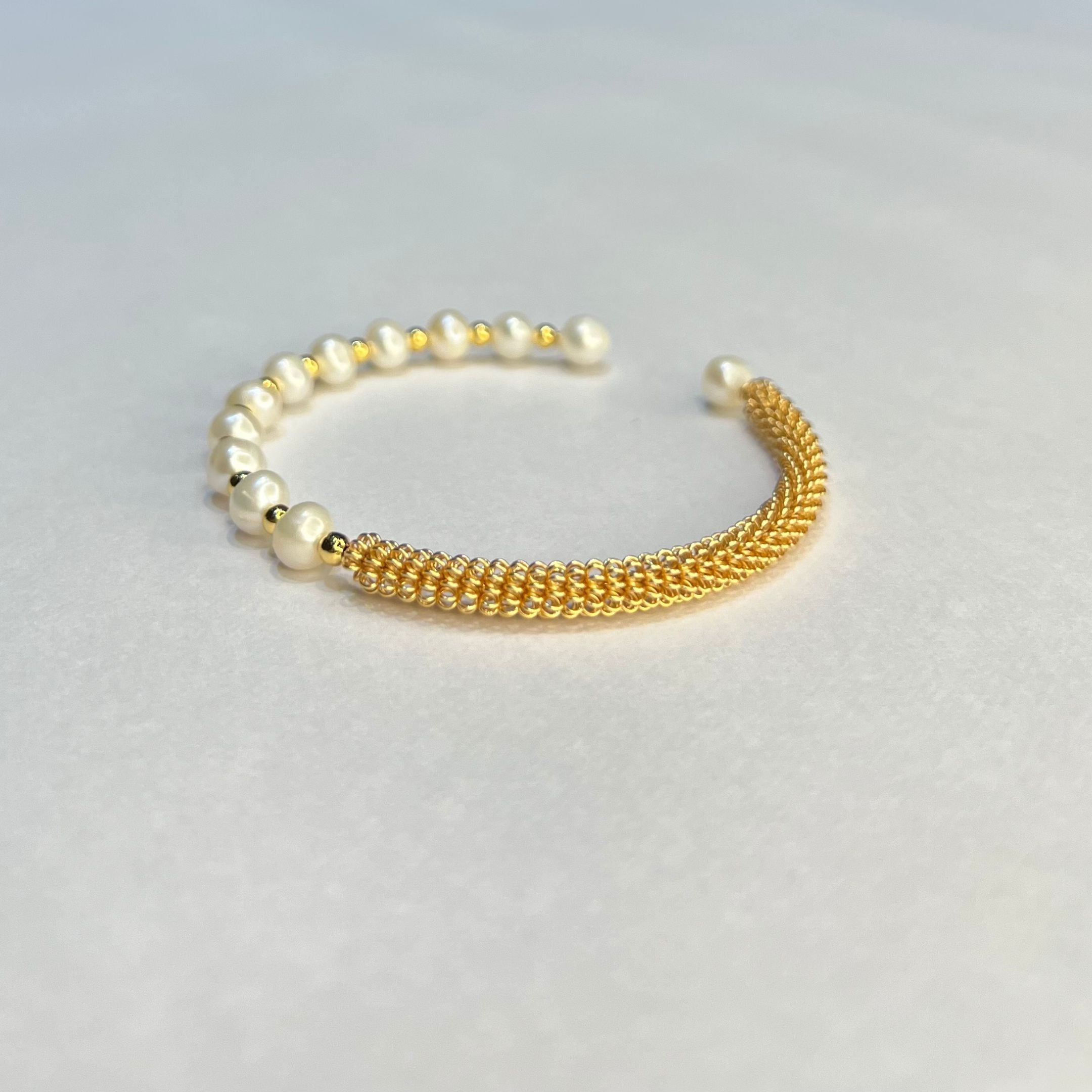 Divine Knot Pearl Rakhi Bracelet
