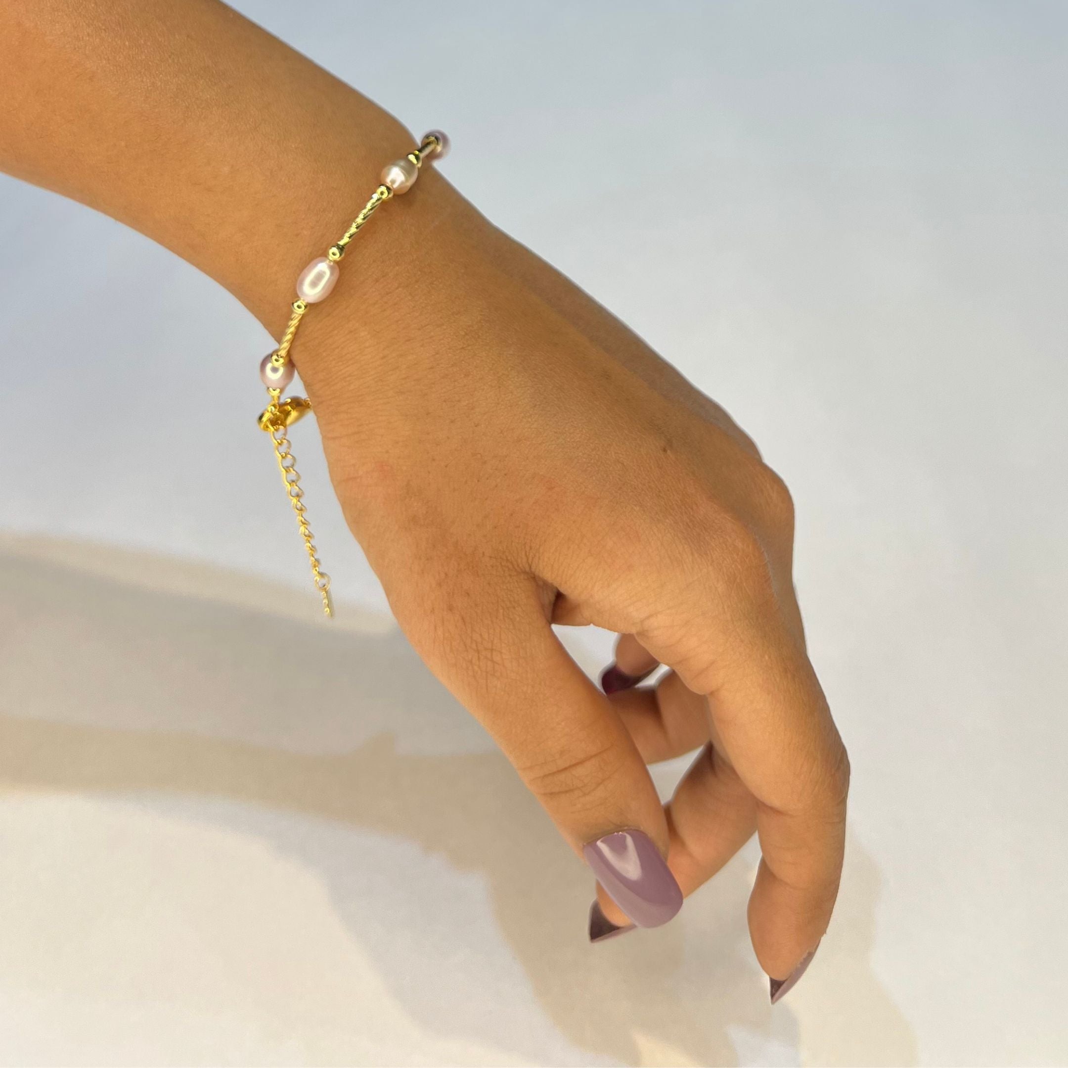 Rose Glow Pearl Rakhi Bracelet