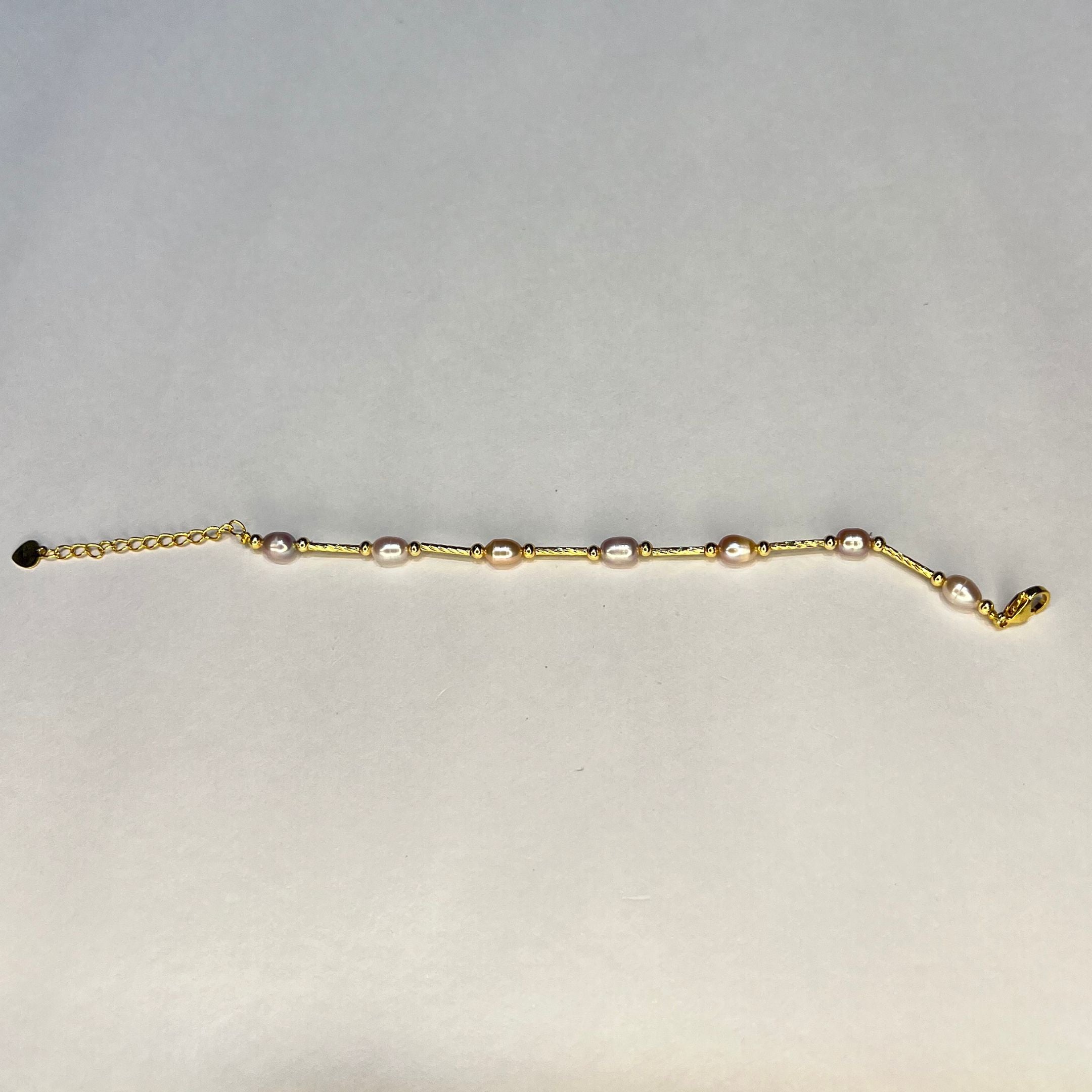 Rose Glow Pearl Rakhi Bracelet