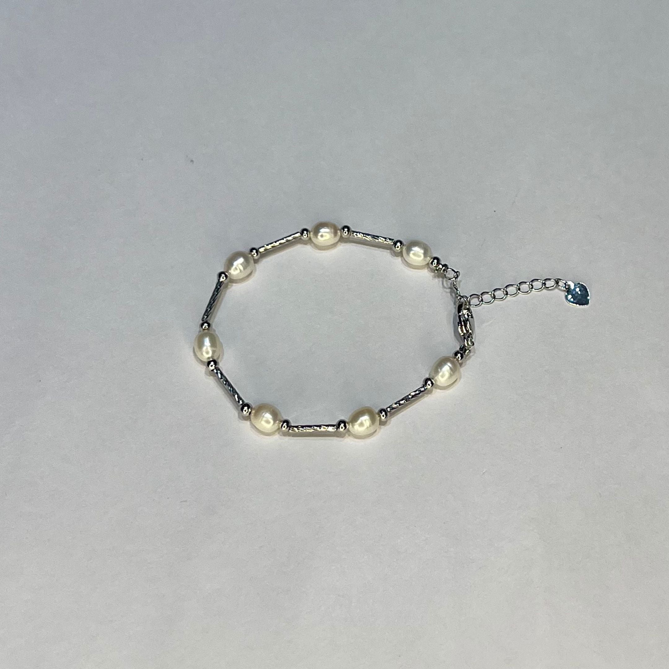 Threaded Gleam Pearl Rakhi Bracelet