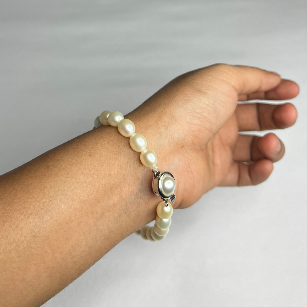 Single Row Cream Oval Pearl Bracelet (7.20mm)