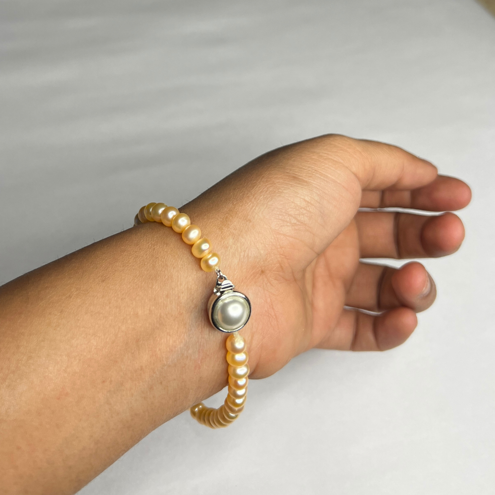 Peach Single Row Button Pearl Bracelet (5.20mm)