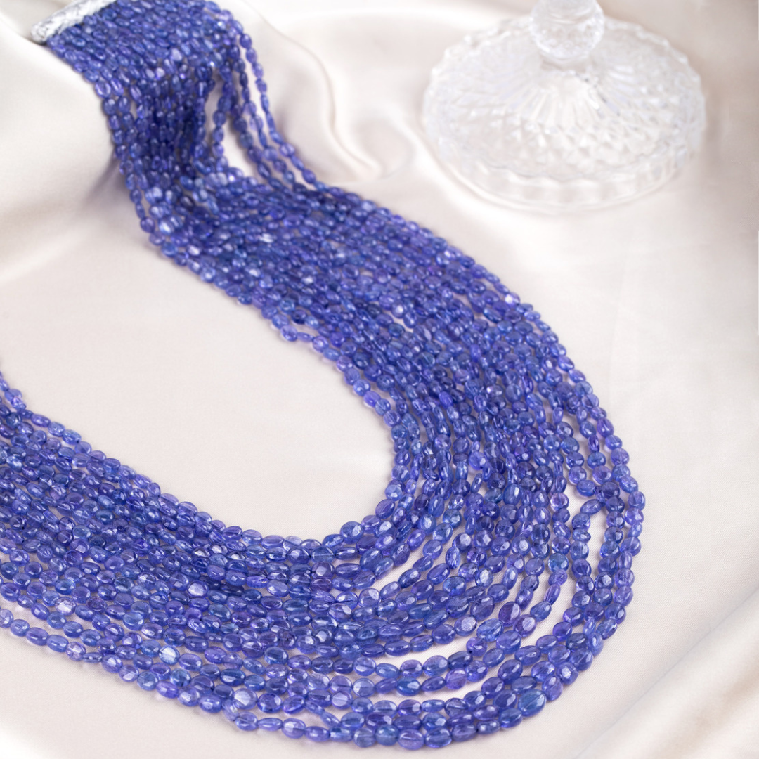 Twinkling Tanzanite Delight: Fourteen-Line Round Gem Necklace