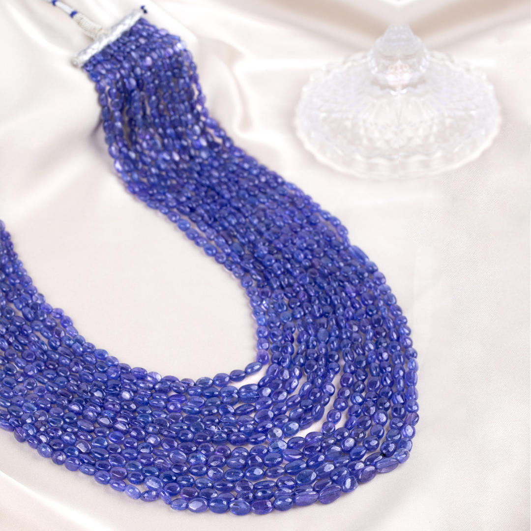 Gleaming Unity: Thirteen-Line Tanzanite Round Gem Necklace